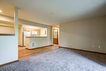 Living room with view of the kitchen counter
